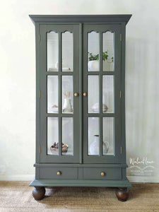 Olive green display cabinet