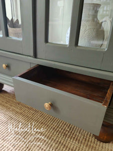 Olive green display cabinet